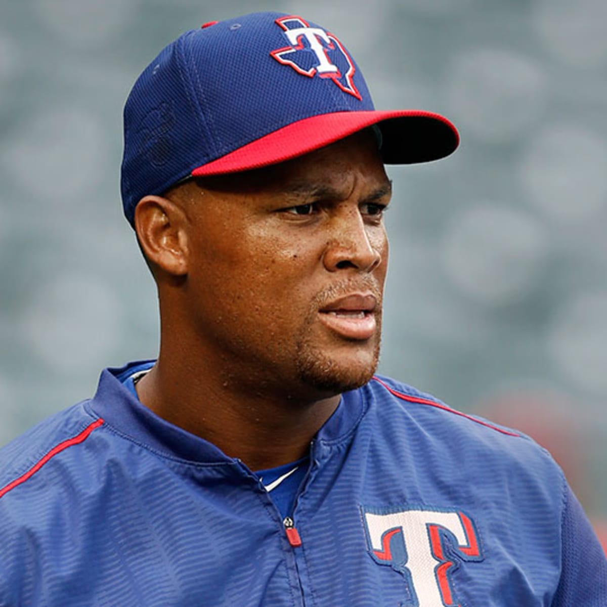 Texas Rangers Adrian Beltre (R) is greeted by Elvis Andrus (1