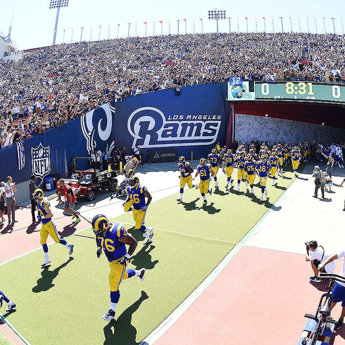 Rams on the sideline at the L.A. Coliseum, 1957.