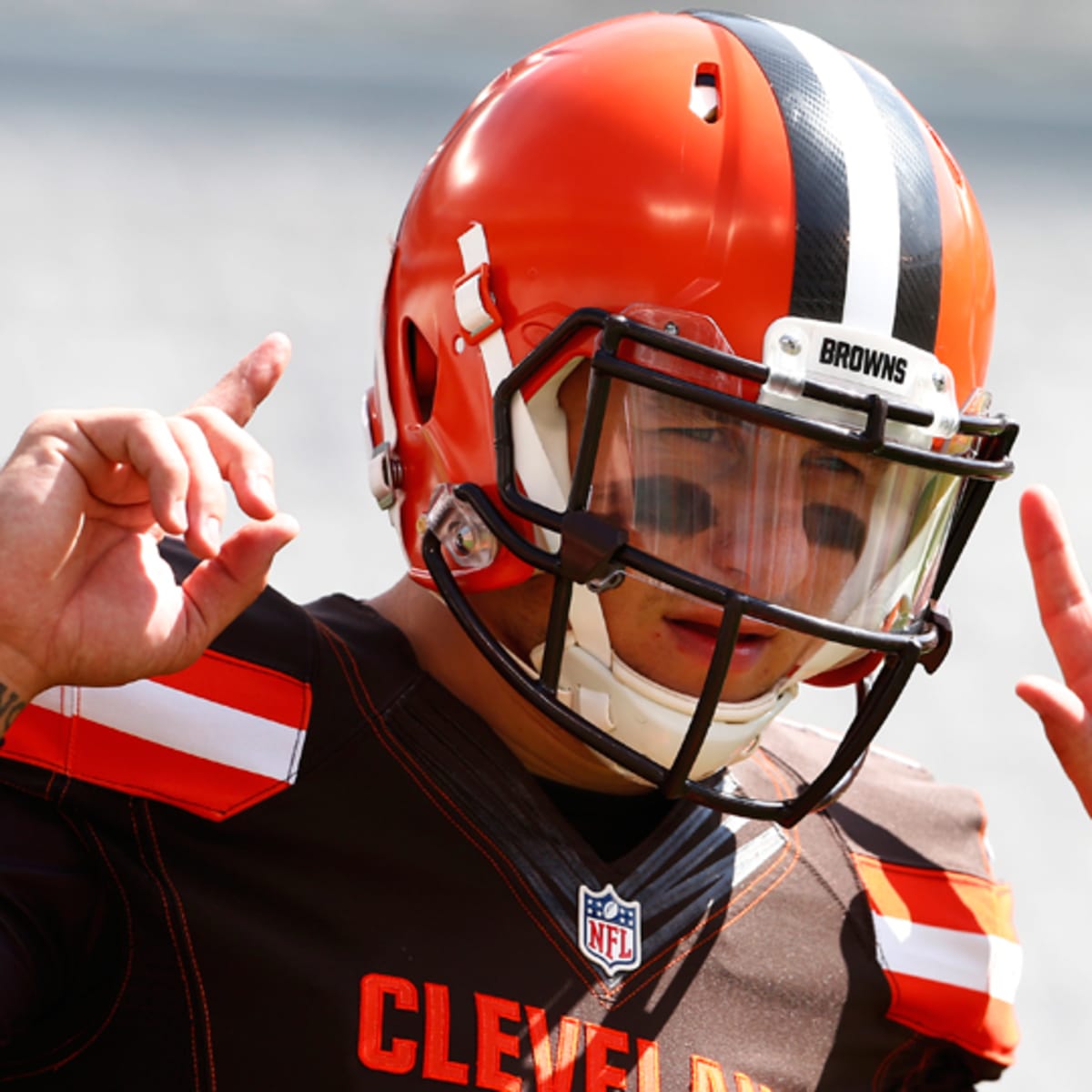 Cleveland Browns quarterback Johnny Manziel looks to pass on the run in the  second half of an NFL football game against the Cincinnati Bengals,  Thursday, Nov. 5, 2015, in Cincinnati. The Bengals