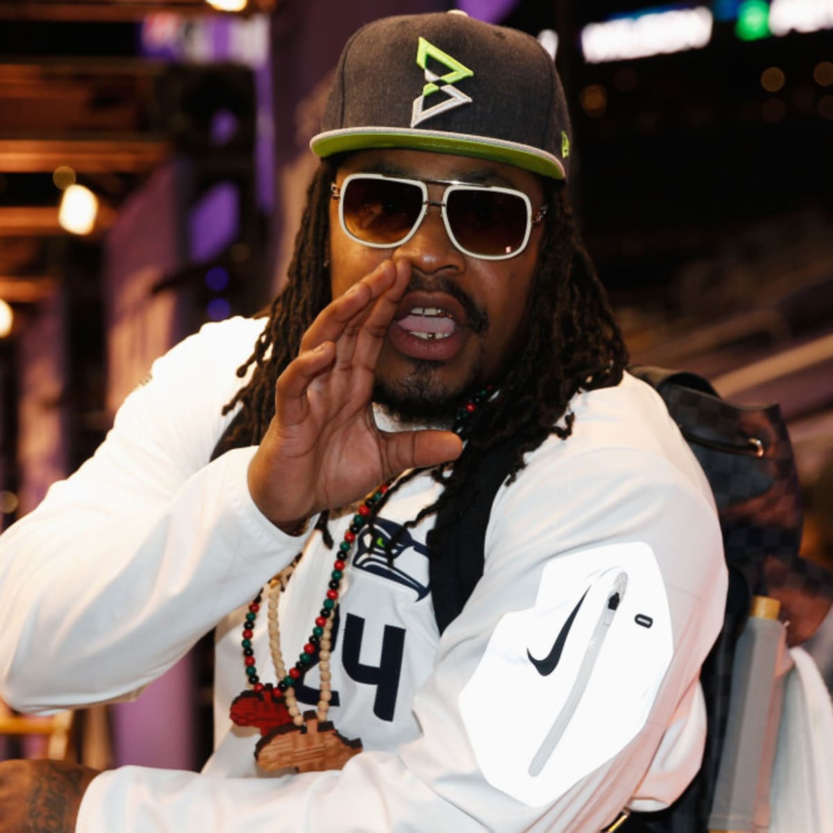 Marshawn Lynch Selling I M Just Here So I Won T Get Fined Shirts Sports Illustrated