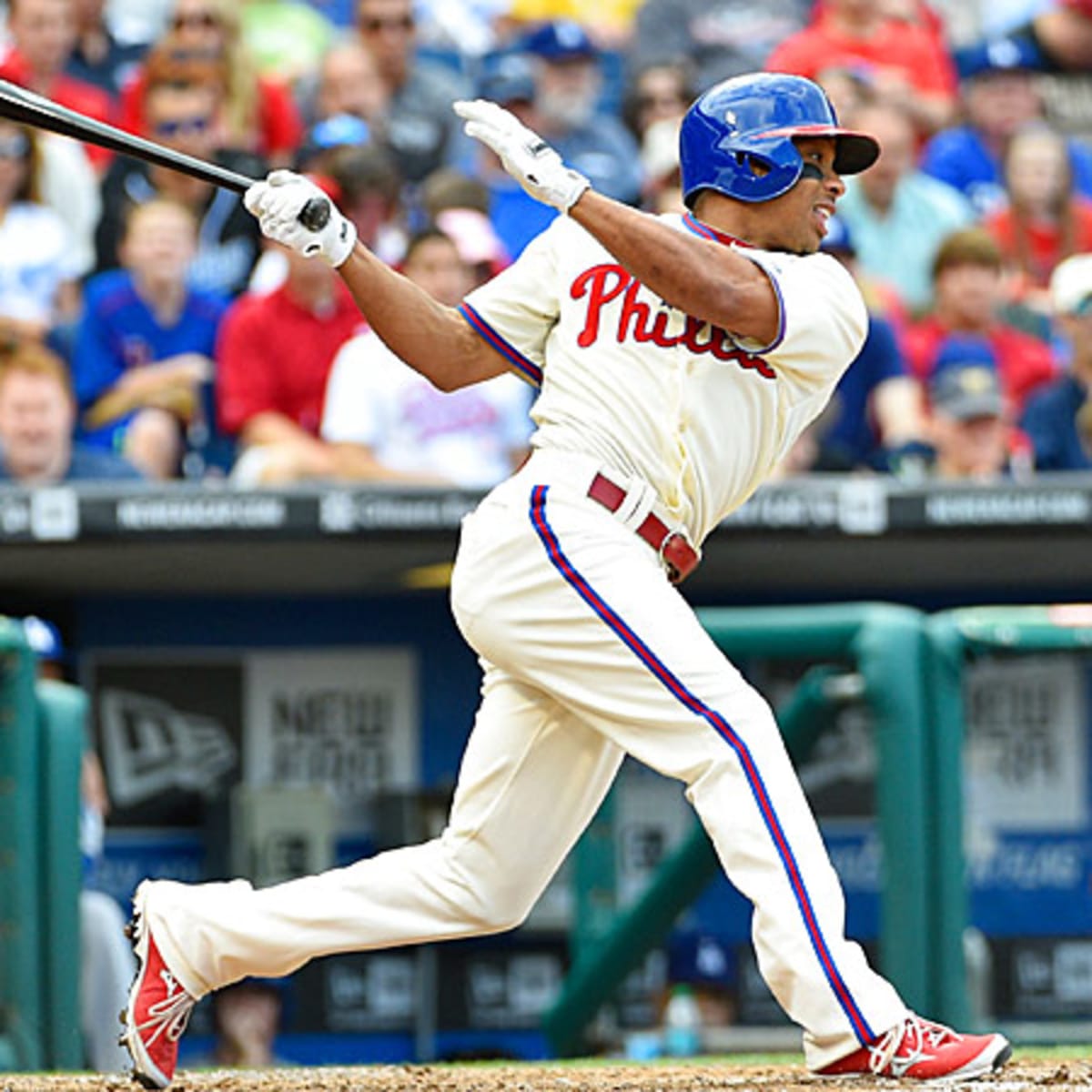 Revere hits rare homer as Phillies beat Nationals in 11