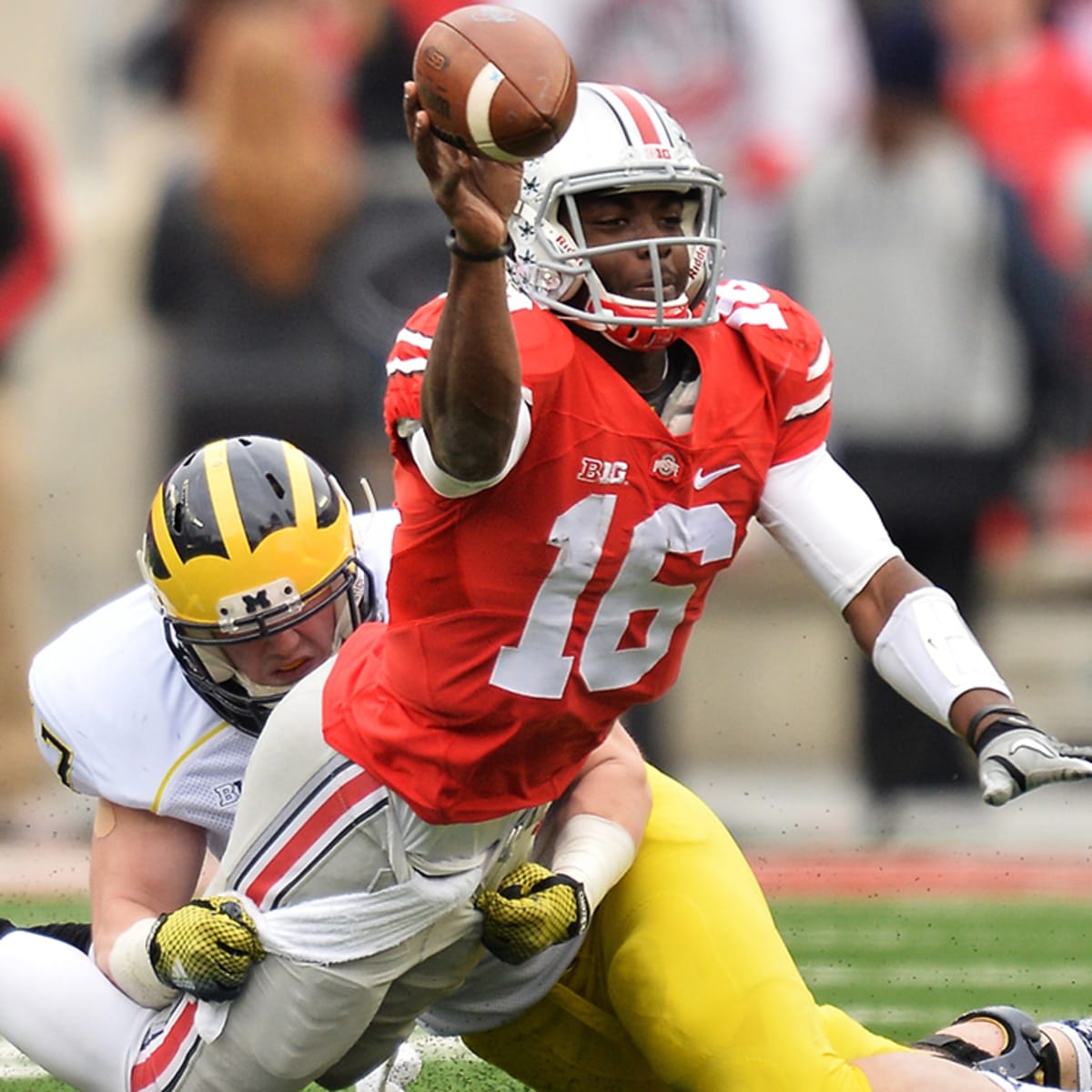 J.T. Barrett injury: Ohio State QB suffers right ankle fracture, carted off  against Michigan - Sports Illustrated