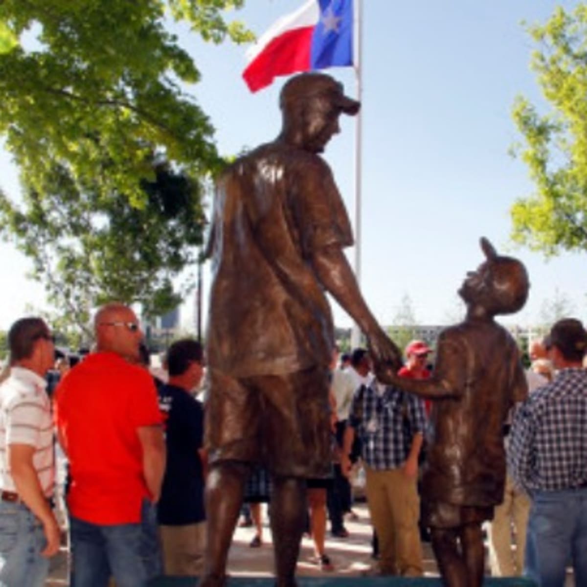 Rangers fans left beer cans all over a statue honoring deceased