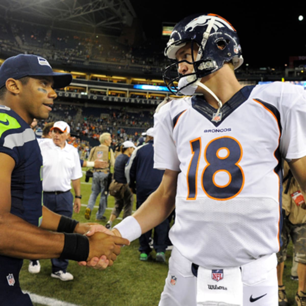 Russell Wilson, Peyton Manning visit Coors Field