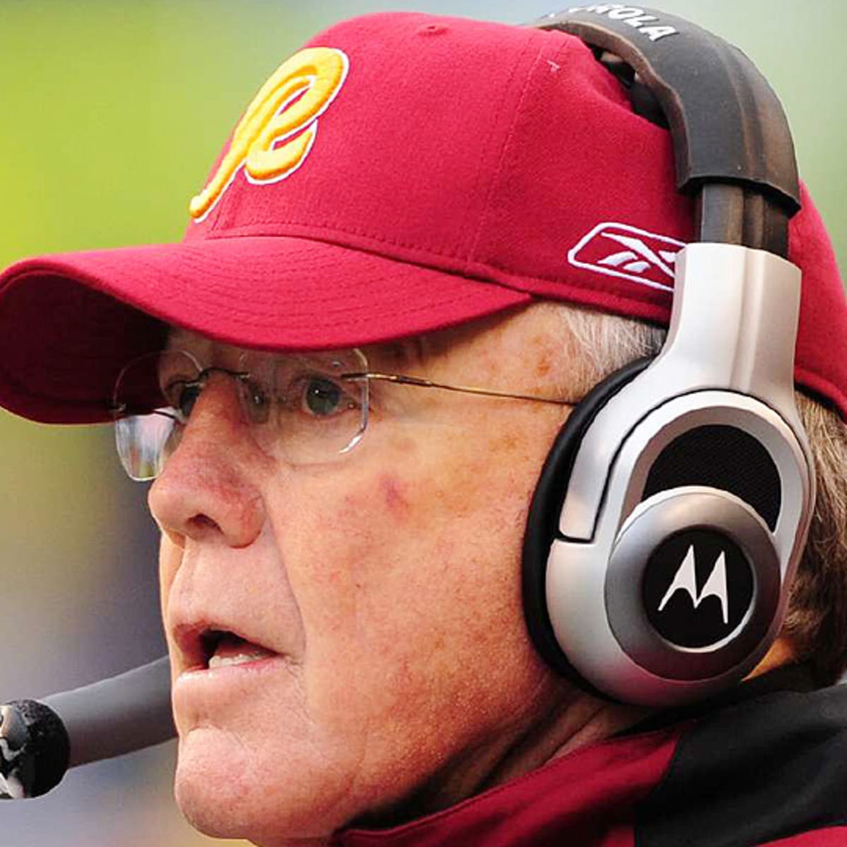 Head coach Joe Gibbs of the Washington Redskins looks on from the