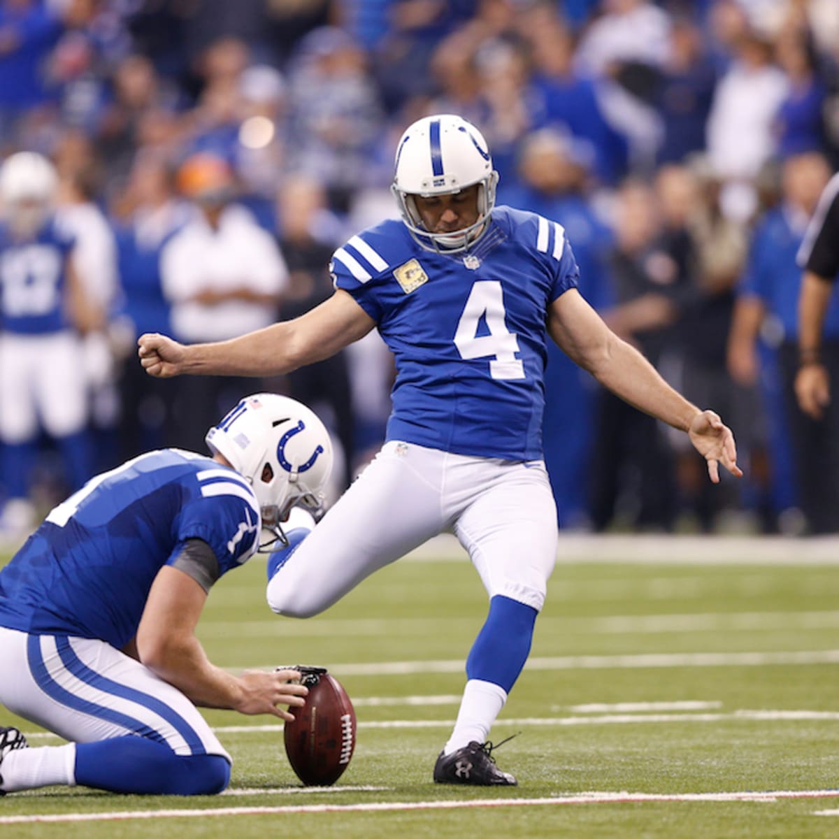 Indianapolis Colts kicker Adam Vinatieri sits on the bench while his team  plays the Baltimore Ravens, during the divisional round of the AFC playoffs  at M & T Bank Stadium in Baltimore