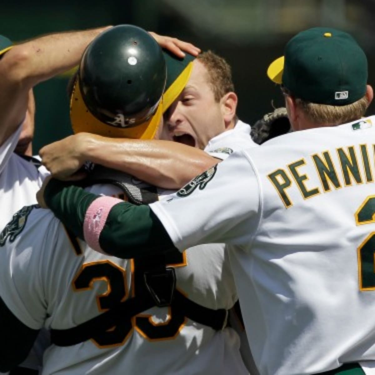 Former Oakland Athletics pitcher Dallas Braden wears a jersey of