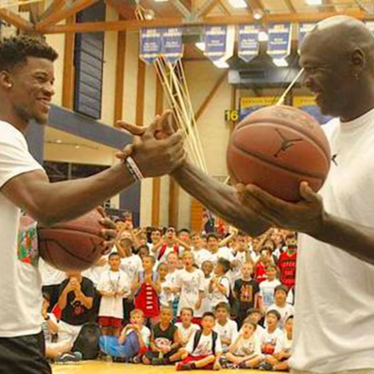 Jordan, Jimmy Butler face off in camp shooting contest - Sports Illustrated