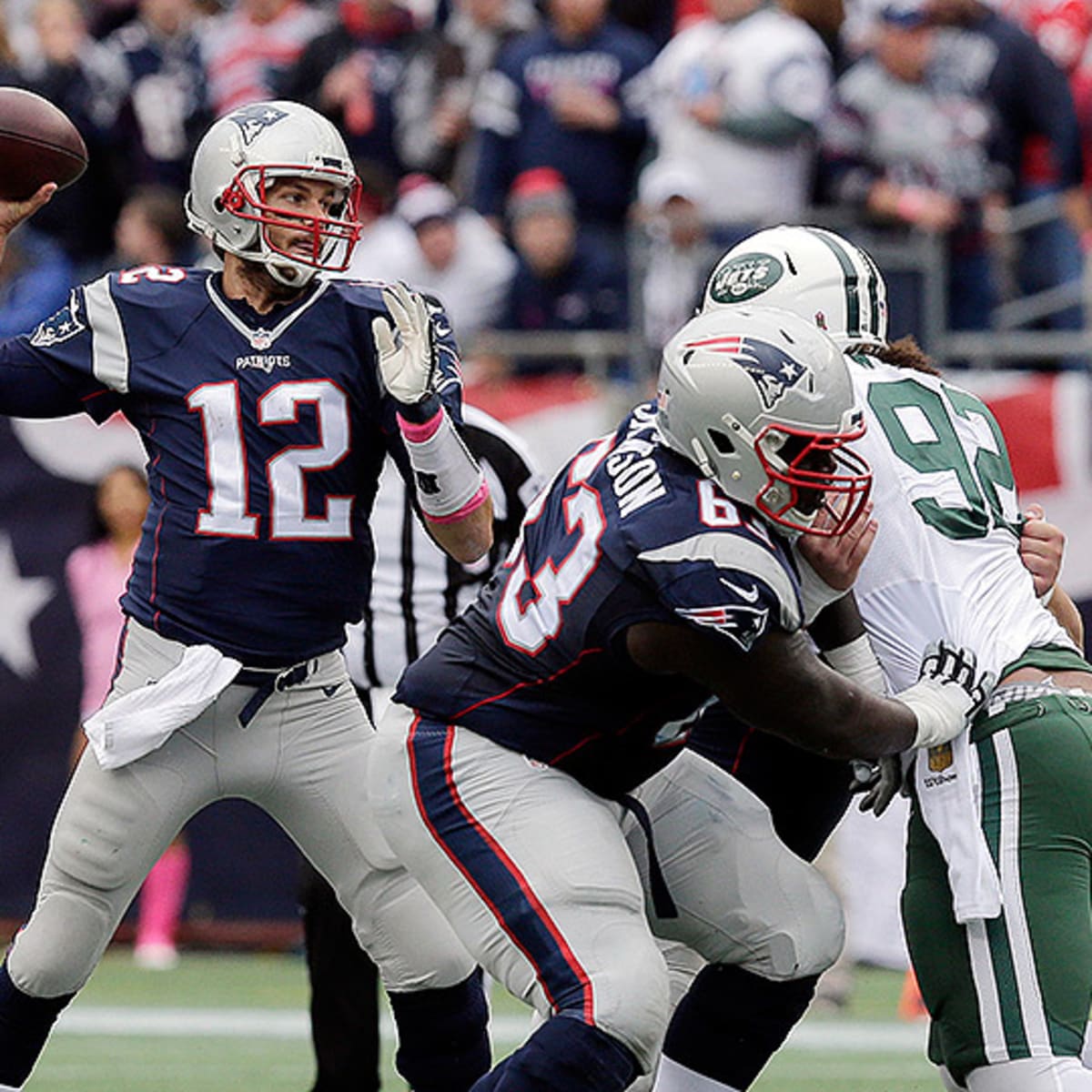 AFC East: New England Patriots — Quarterback Tom Brady (12) drops back to  pass against the San Diego Chargers during the fourth quarter at Qualcomm  Stadium on Dec. 7, 2014. (Jake Roth-USA