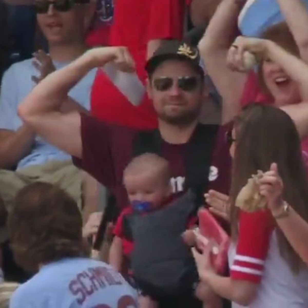 Phillies fan expertly catches home run ball while holding his baby