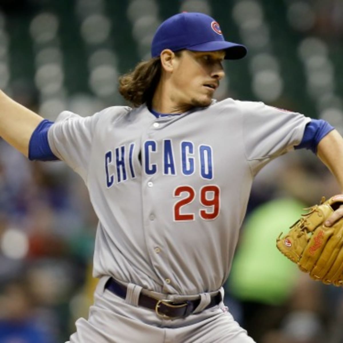 Chicago Cubs starting pitcher Jeff Samardzija delivers during the first  inning of the Wrigley Field 100th anniversary game against the Arizona  Diamondbacks at Wrigley Field on April 23, 2014 in Chicago. The