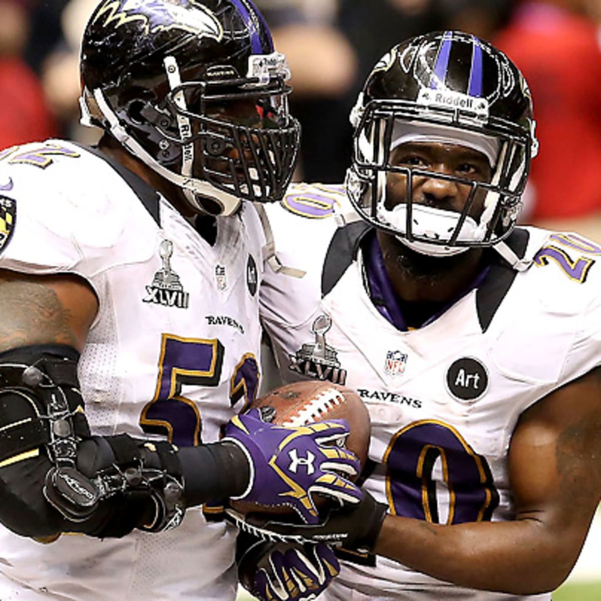 Baltimore Ravens safety Ed Reed celebrates with the Lombardi