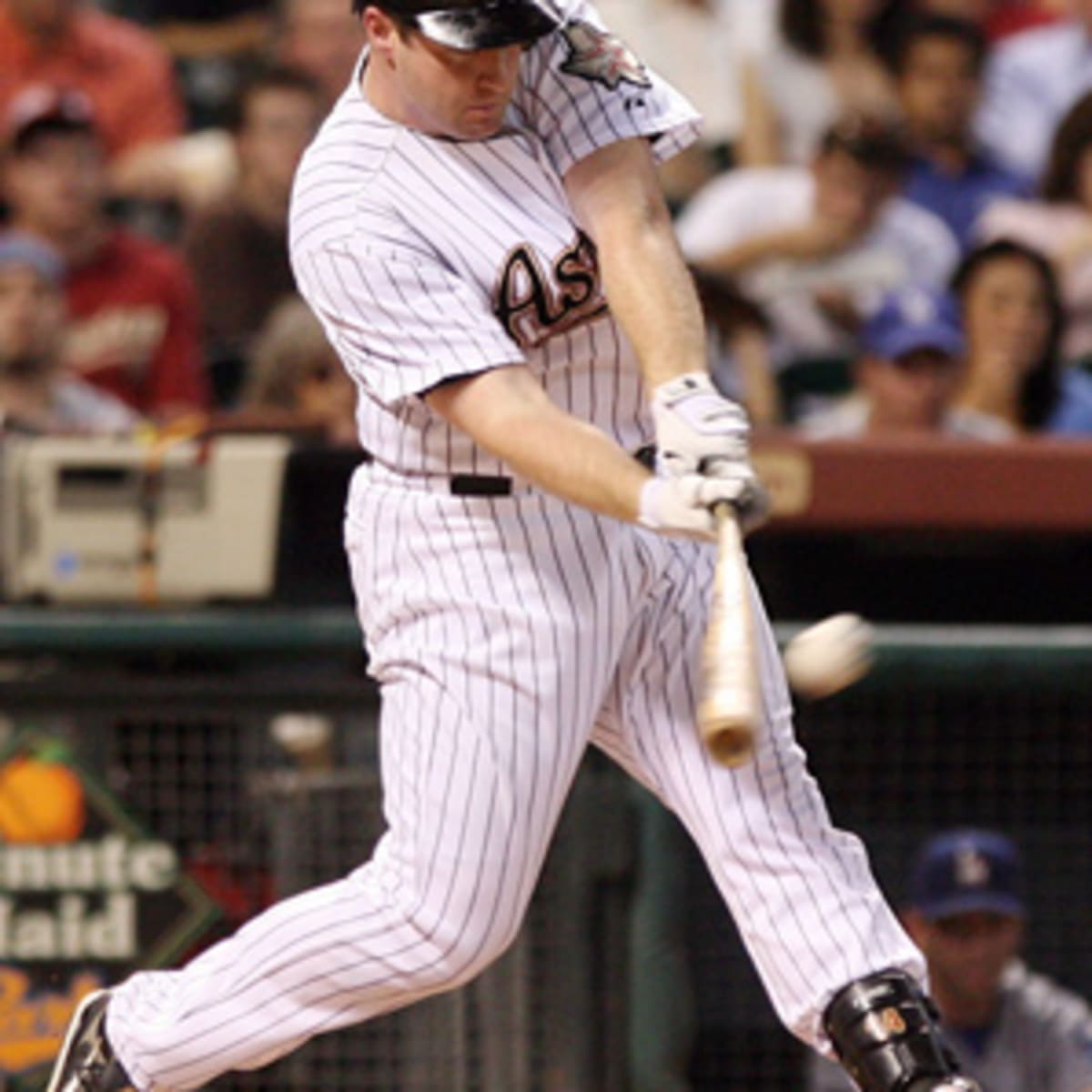 Morgan Ensberg of the Houston Astros attempts to field a groud ball News  Photo - Getty Images