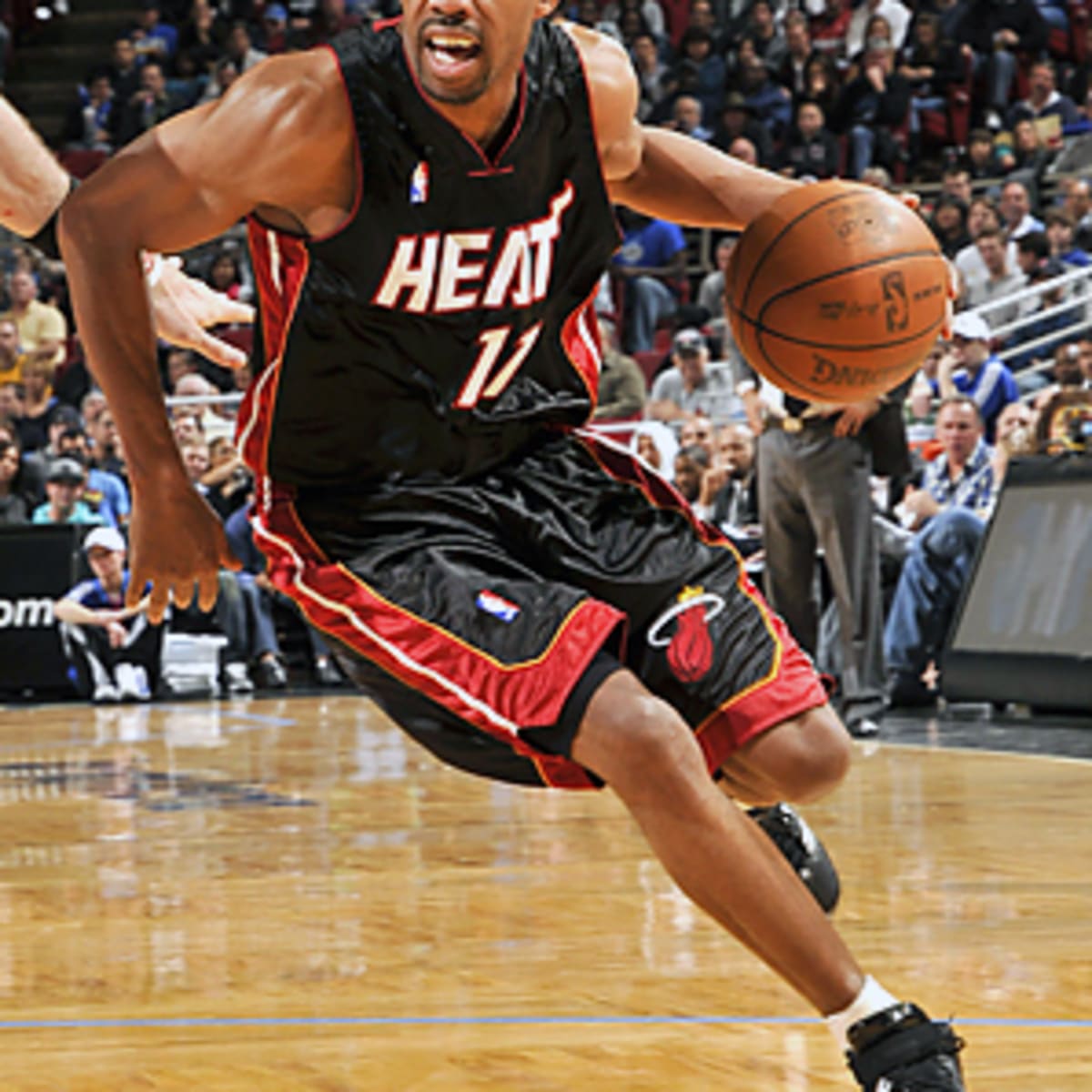Miami Heat guard Rafer Alston, right, attempts to steal the ball