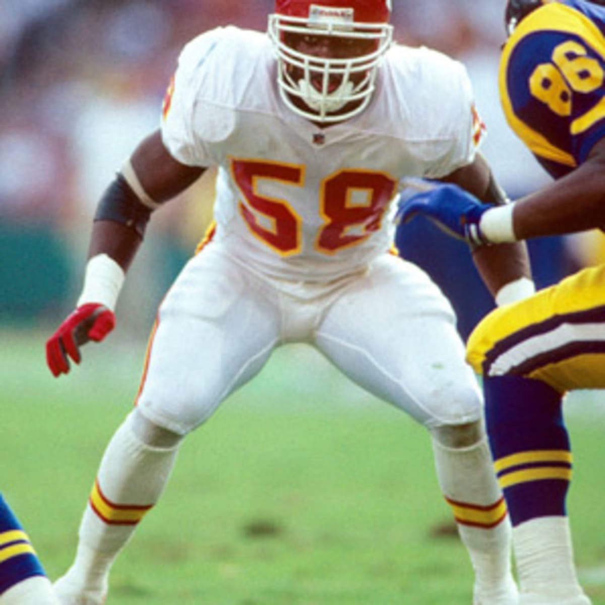 The Kansas City Chiefs - Derrick Thomas celebrates his 100th