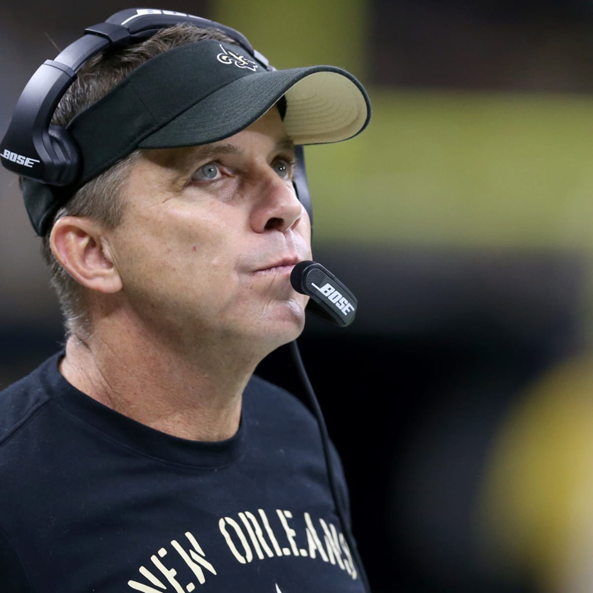 New Orleans Saints head coach Sean Payton (R) watches a replay on the  jumbotron at the Mercedes-Benz Superdome during play against the Baltimore  Ravens in New Orleans September 1, 2016. Photo by