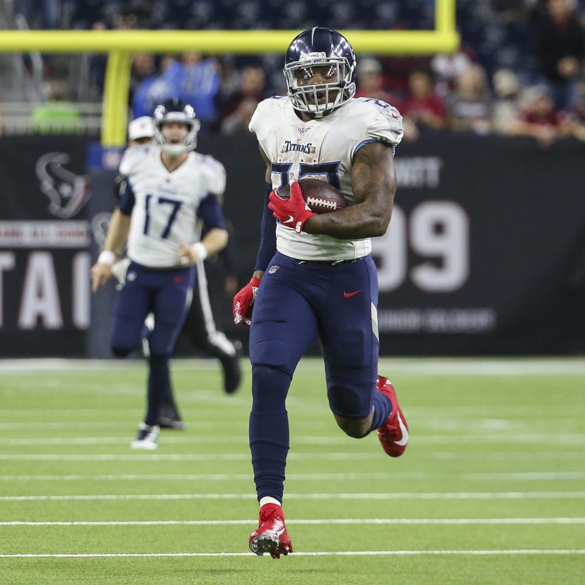 December 29, 2019: Tennessee Titans running back Derrick Henry (22) carries  the ball during the 2nd quarter of an NFL football game between the  Tennessee Titans and the Houston Texans at NRG