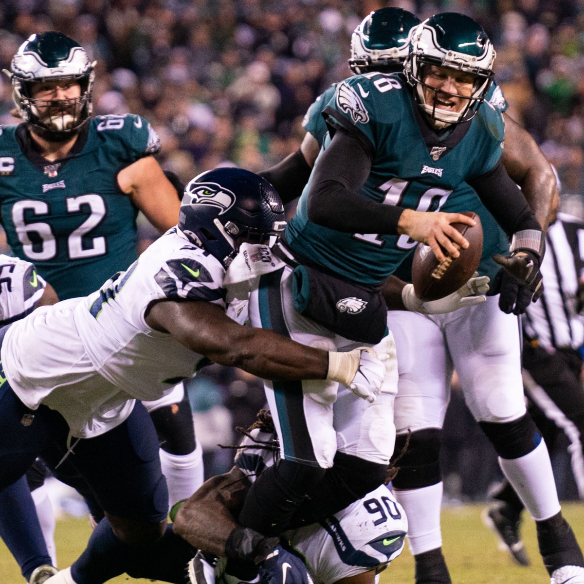 Cardinals quarterback Josh McCown scrambles during the Dallas