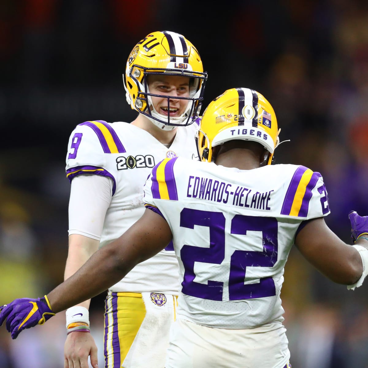 Clyde Edwards-Helaire LSU Tigers Unsigned White Jersey Reaction After  Scoring Touchdown Photograph