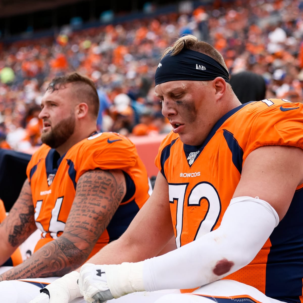 Denver Broncos offensive guard Dalton Risner (66) jokes with teammates  after taking part in drills at an NFL football training camp at team  headquarters Saturday, July 31, 2021, in Englewood, Colo. (AP