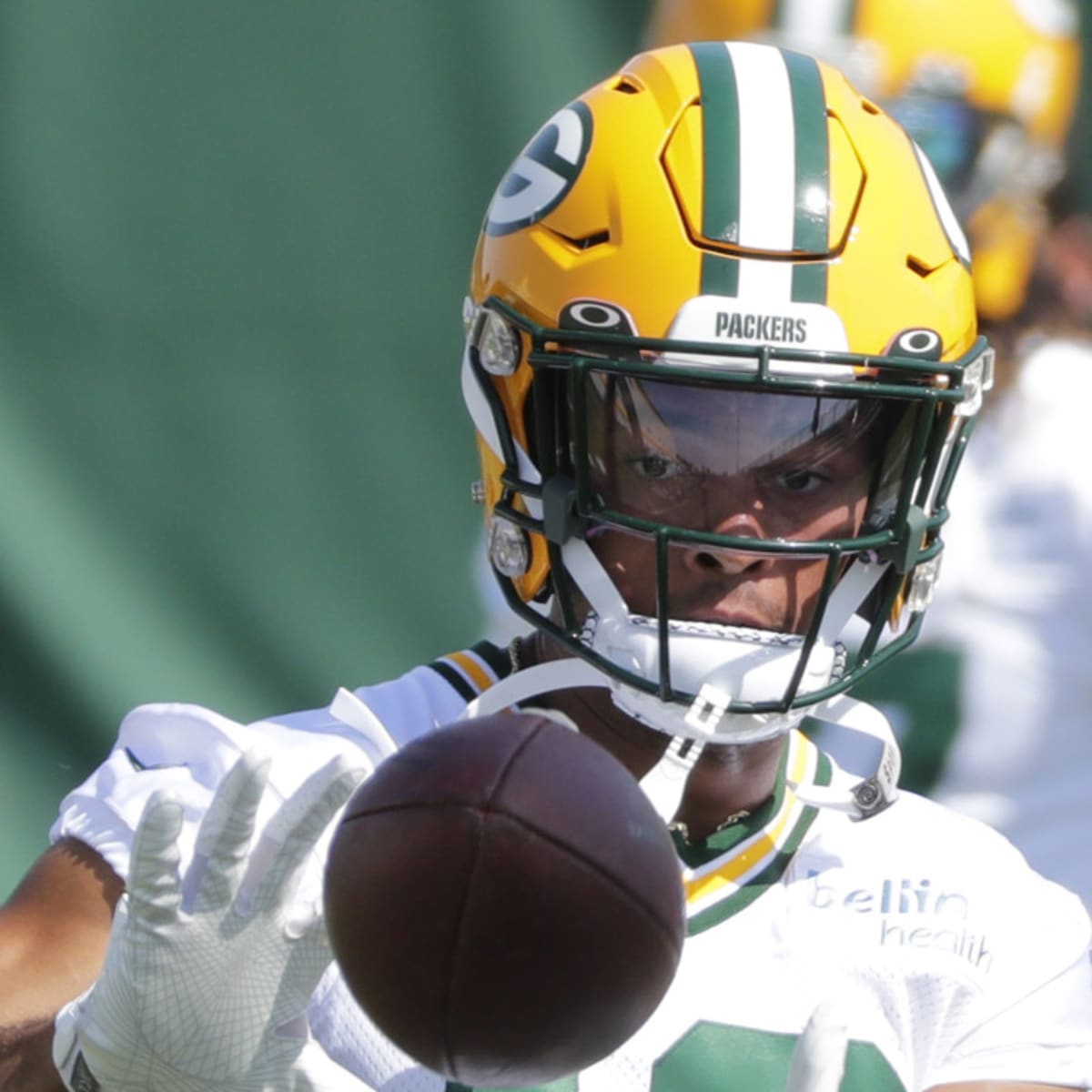 B/R Gridiron - Brothers Equanimeous (Packers WR) and Amon-Ra St. Brown  (Lions WR) are facing off today. Their dad John came ready with the double  jersey 