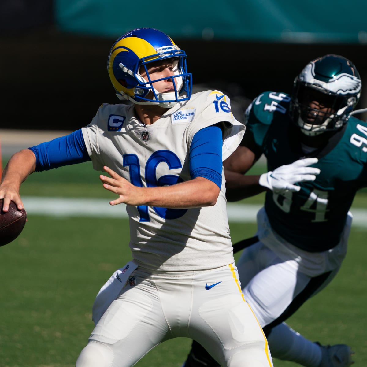 Los Angeles Rams quarterback Jared Goff (16) off balance after