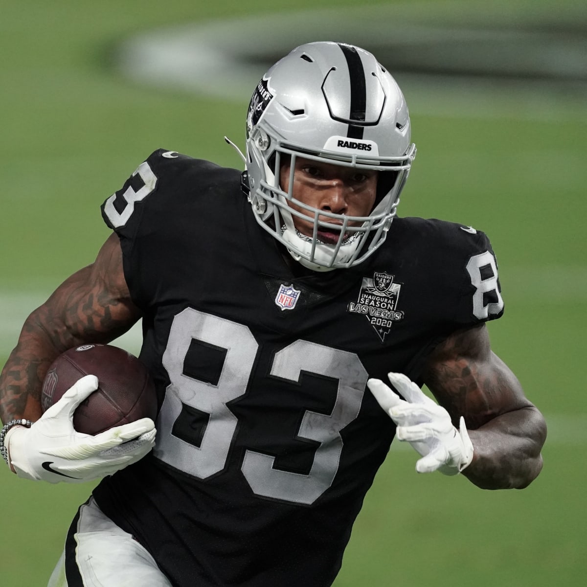 Las Vegas Raiders tight end Darren Waller warms up before the