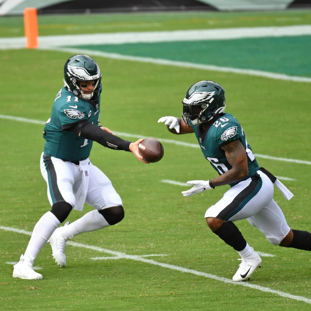 Miles Sanders has career day as Eagles' battered O-line survives