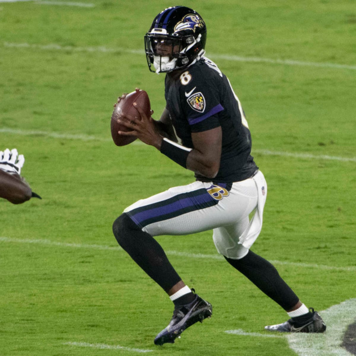 Here's why Ravens QB Lamar Jackson wore gold cleats in Las Vegas