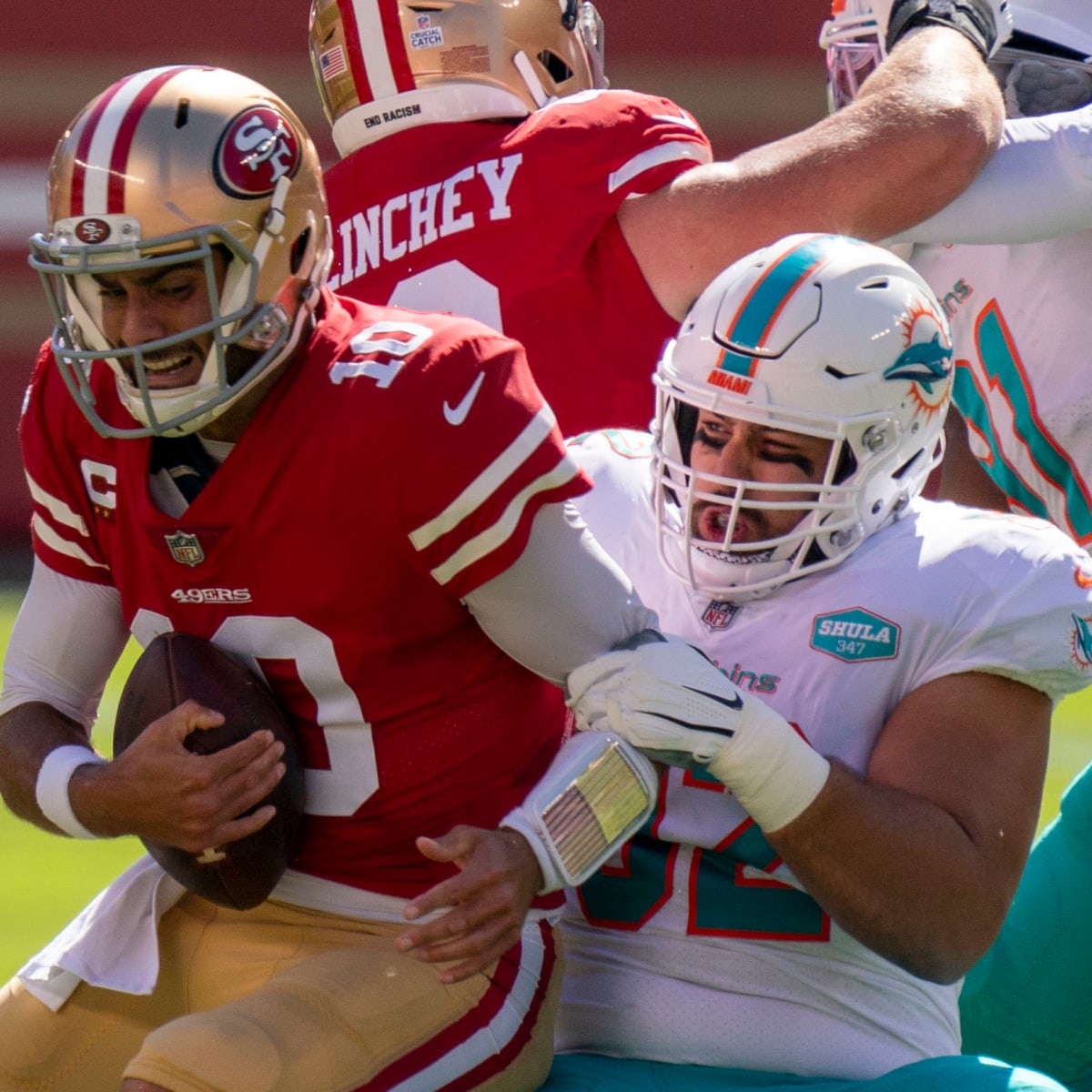 49ers dominate Dolphins, lose Garoppolo for season