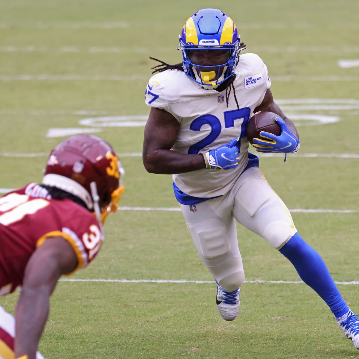 Darrell Henderson Jr of the Los Angeles Rams scores a rushing