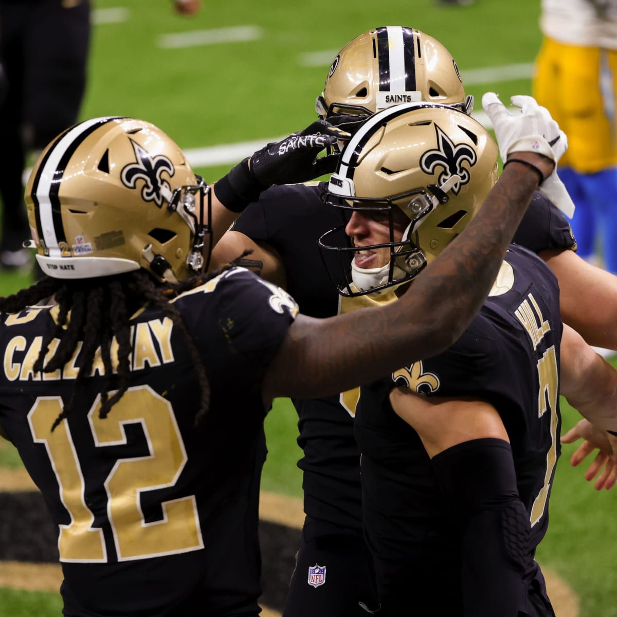 New Orleans Saints tight end Taysom Hill (7) warms up before an NFL  football game against the Green Bay Packers Sunday, Sept. 24, 2023, in  Green Bay, Wis. (AP Photo/Matt Ludtke Stock