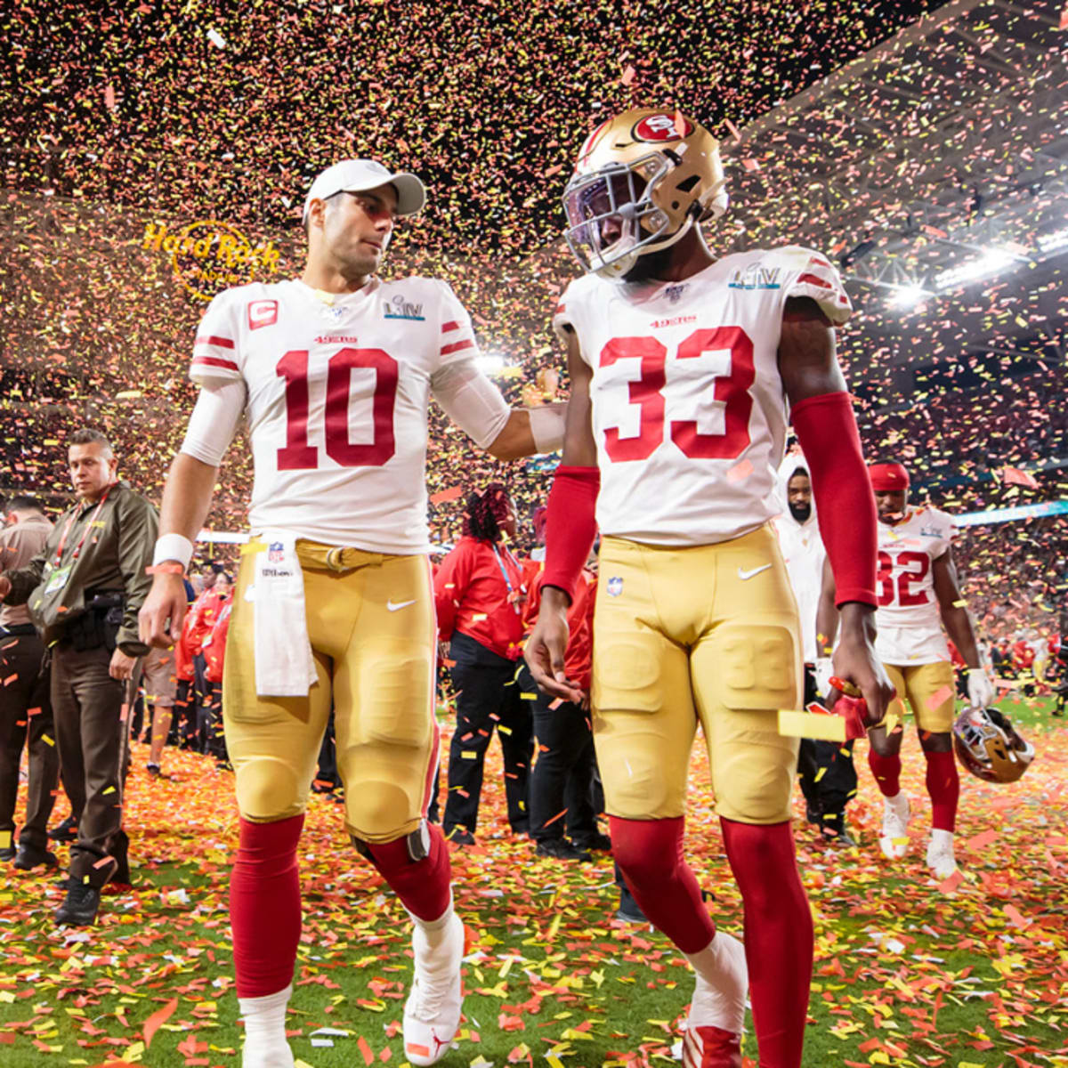 San Francisco 49ers safety Tarvarius Moore, left, and linebacker