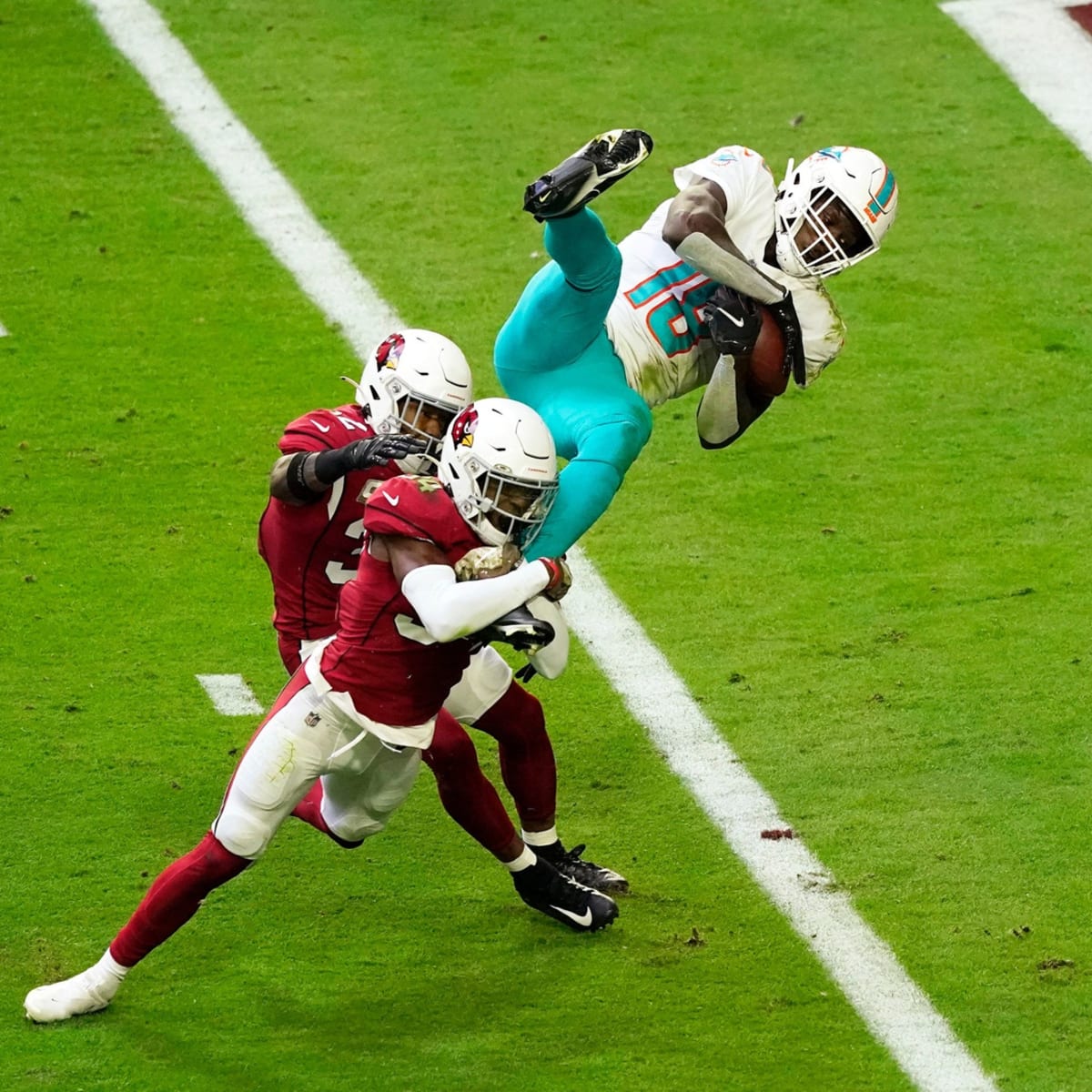 Miami Dolphins wide receiver Preston Williams (18) runs the ball after a  catch against the New York Jets during an NFL football game, Sunday, Nov.  3, 2019, in Miami Gardens, Fla. The