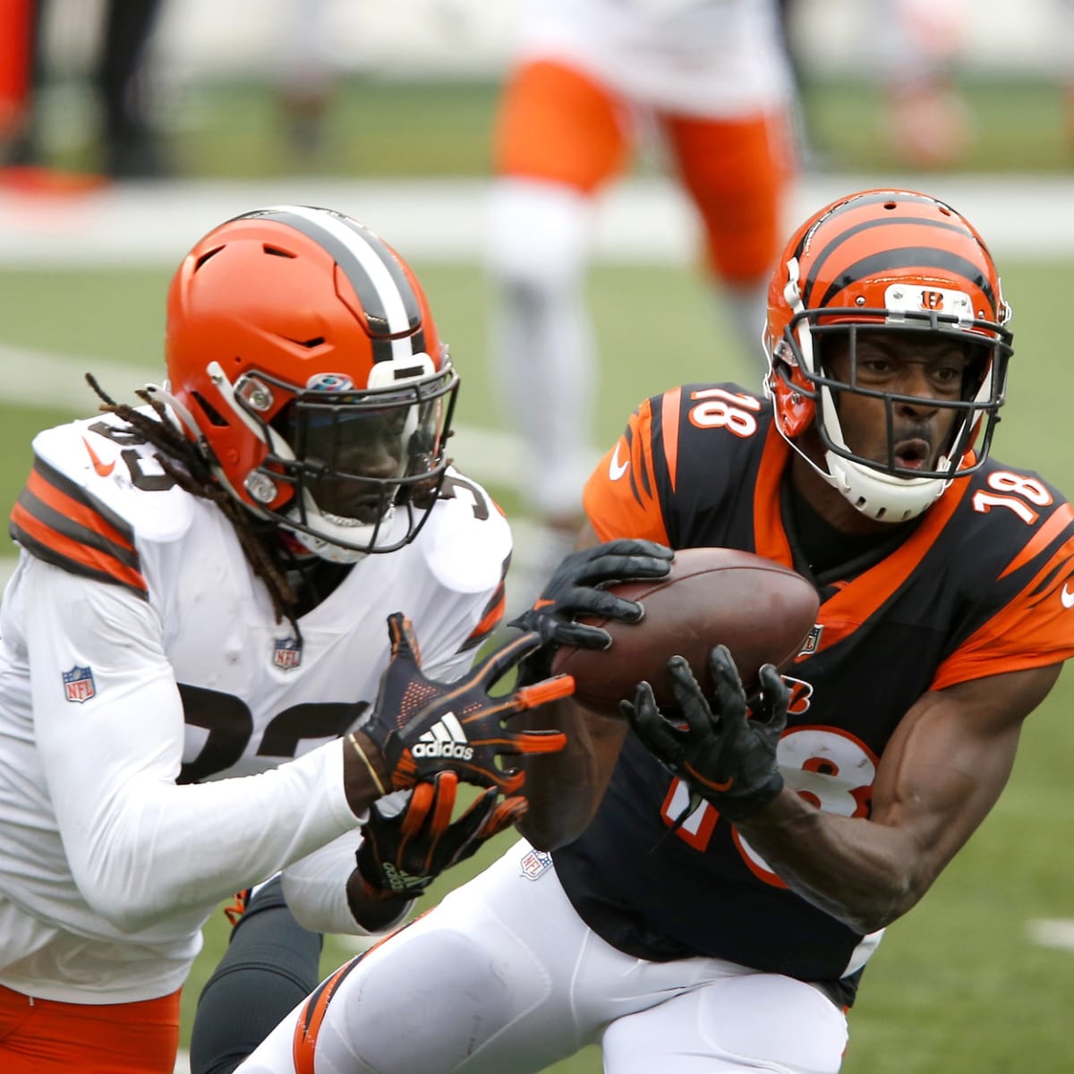 In this Nov. 29, 2020 photo, Cleveland Browns safety Ronnie Harrison Jr.  (33) wears a Salute to Service headband during warm-ups before an NFL  football game against the Jacksonville Jaguars in Jacksonville