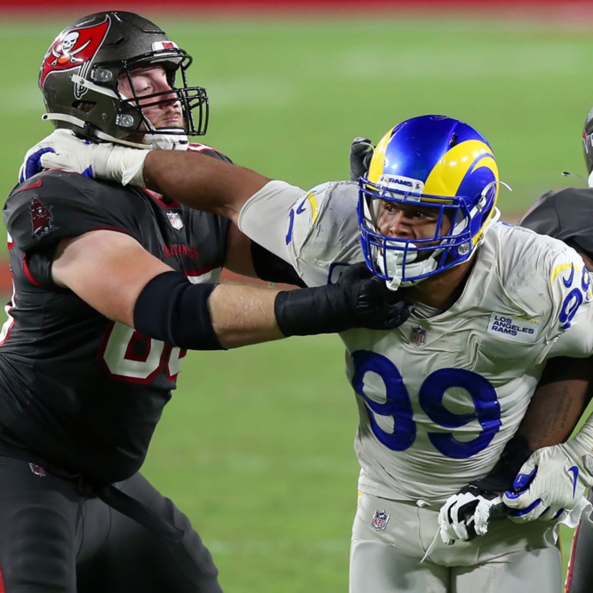 Los Angeles Rams defensive tackle Aaron Donald (99) walks off the field  after a play during the second half of an NFL football game against the Detroit  Lions in Detroit, Michigan USA