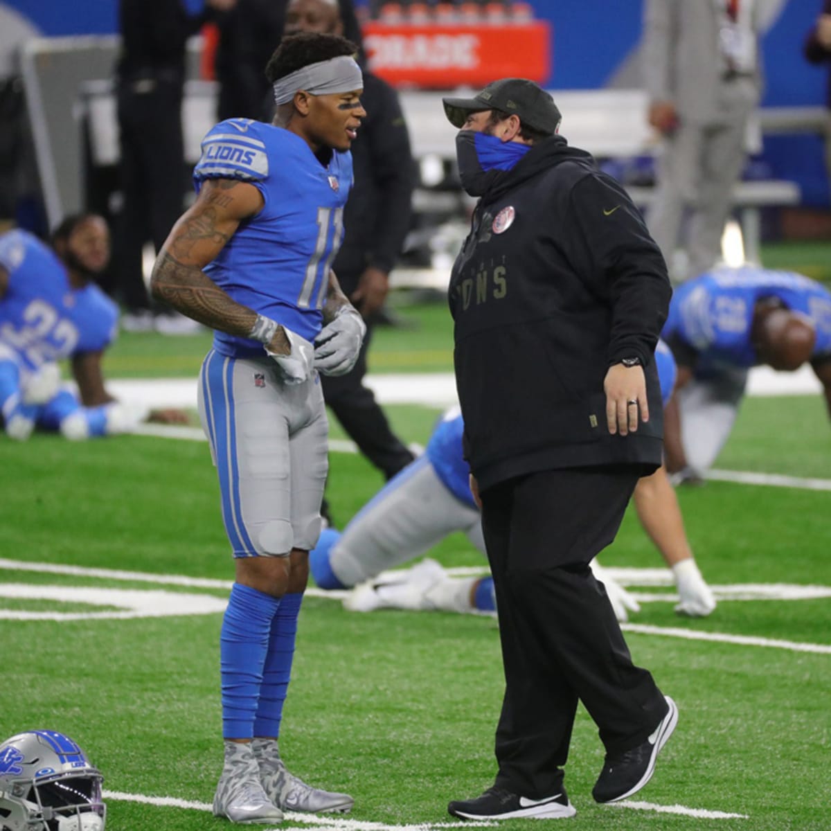 Detroit Lions' Jamie Collins (8) talks with team owner Sheila Ford