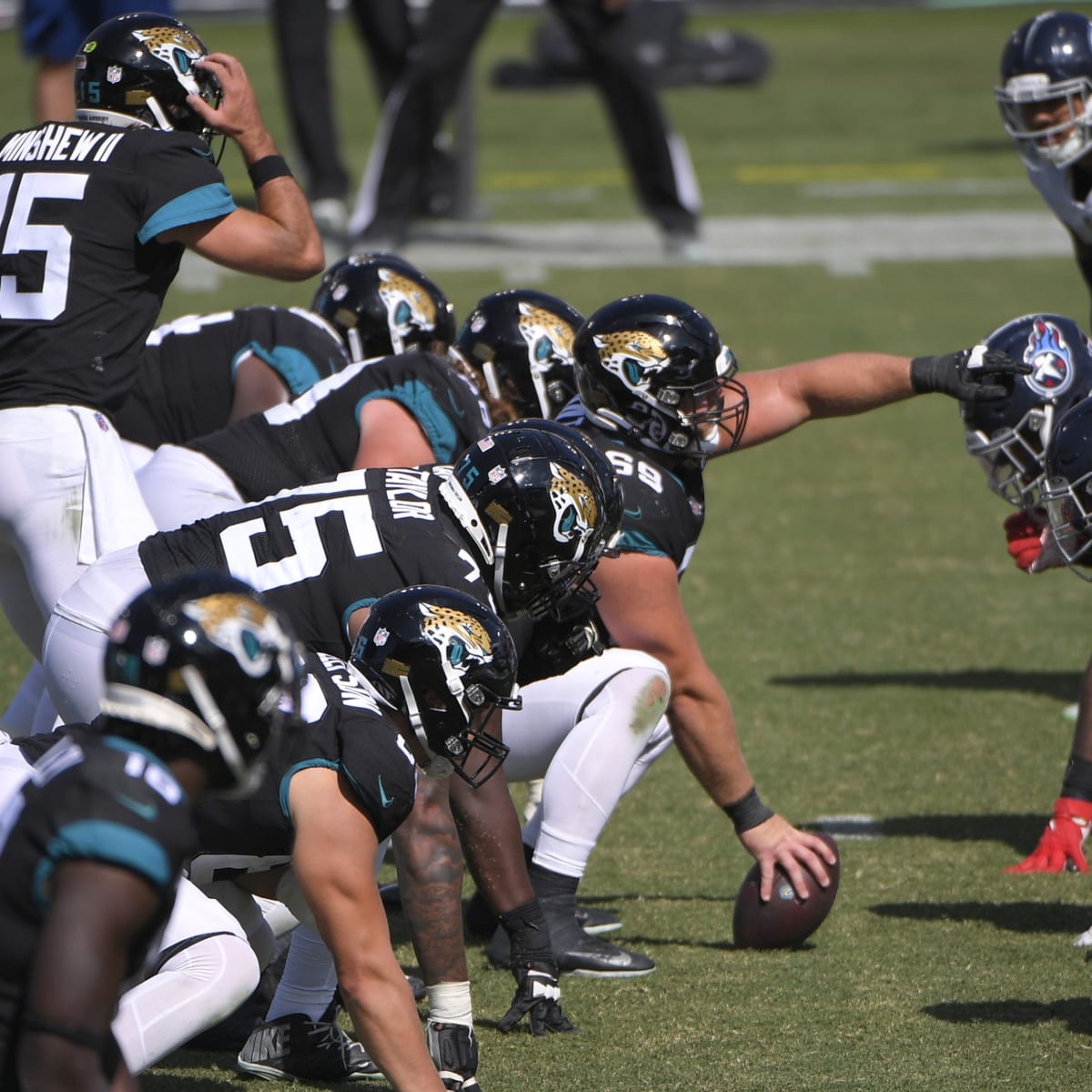 Kenny Vaccaro of the Tennessee Titans flexes his muscles during