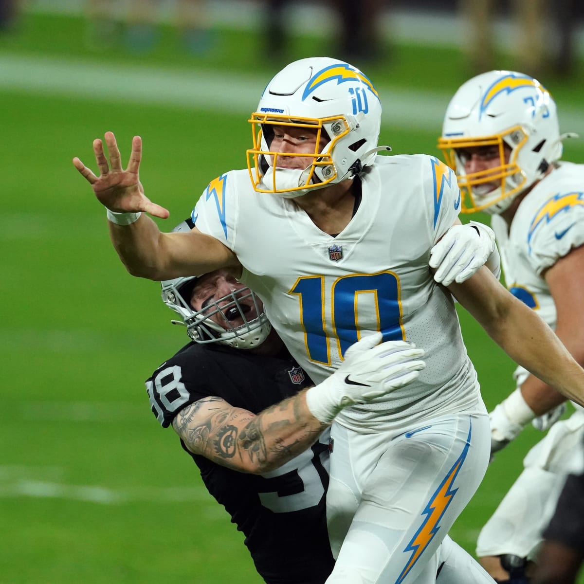 Raiders vs. Chargers score: Justin Herbert leads L.A. to an overtime win  over the Raiders and Marcus Mariota 