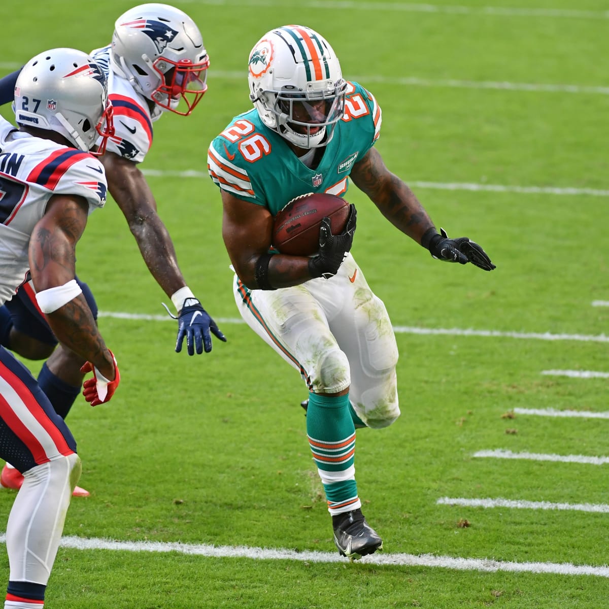 Miami Dolphins running back Salvon Ahmed (26) walks to the