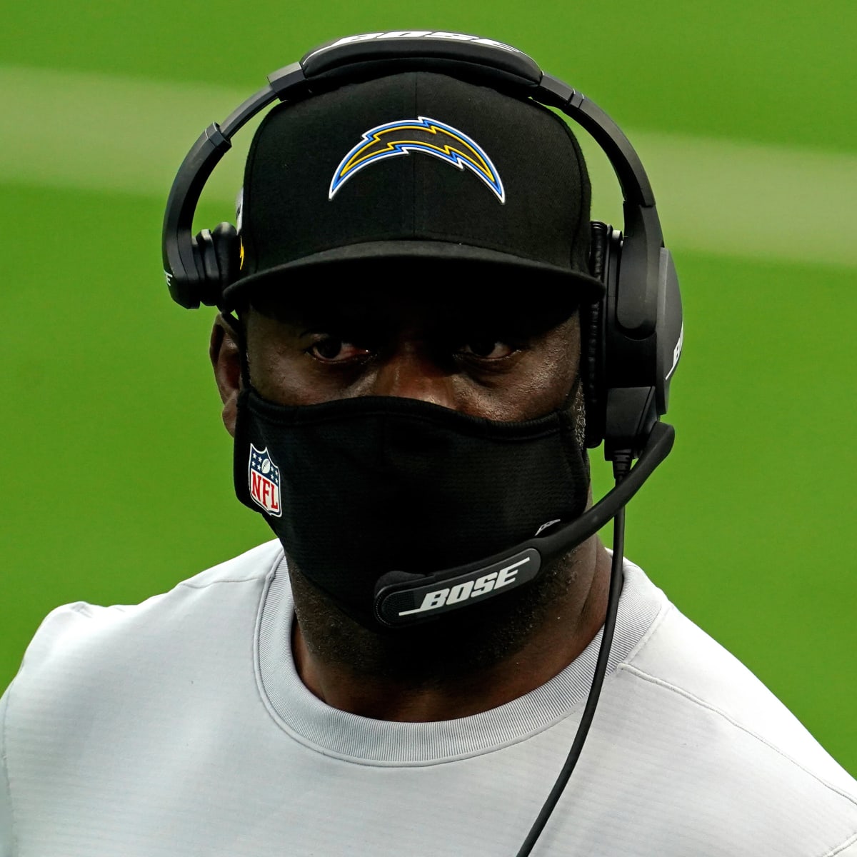 Los Angeles Chargers head coach Anthony Lynn wears a face shield and a Salute  to Service shirt on the field before the Los Angeles Chargers take on the  Miami Dolphins during an NFL football game, Sunday, Nov. 15, 2020, in Miami  Gardens, Fla. (AP