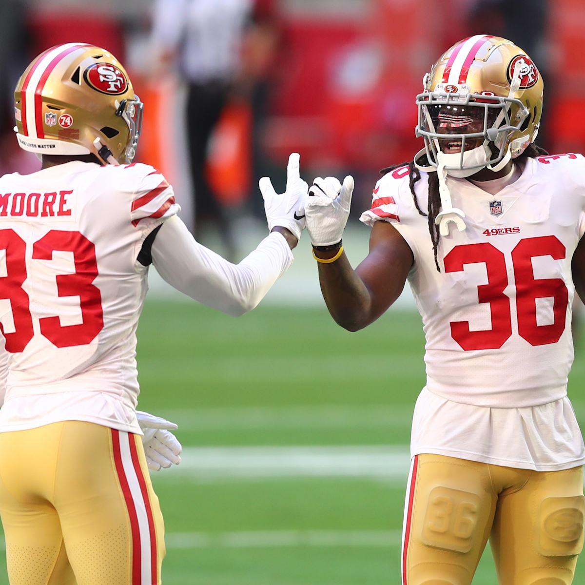 San Francisco 49ers safety Tarvarius Moore, left, and linebacker Azeez  Al-Shaair during an NFL football game against the Los Angeles Chargers in  Santa Clara, Calif., Sunday, Nov. 13, 2022. (AP Photo/Godofredo A.