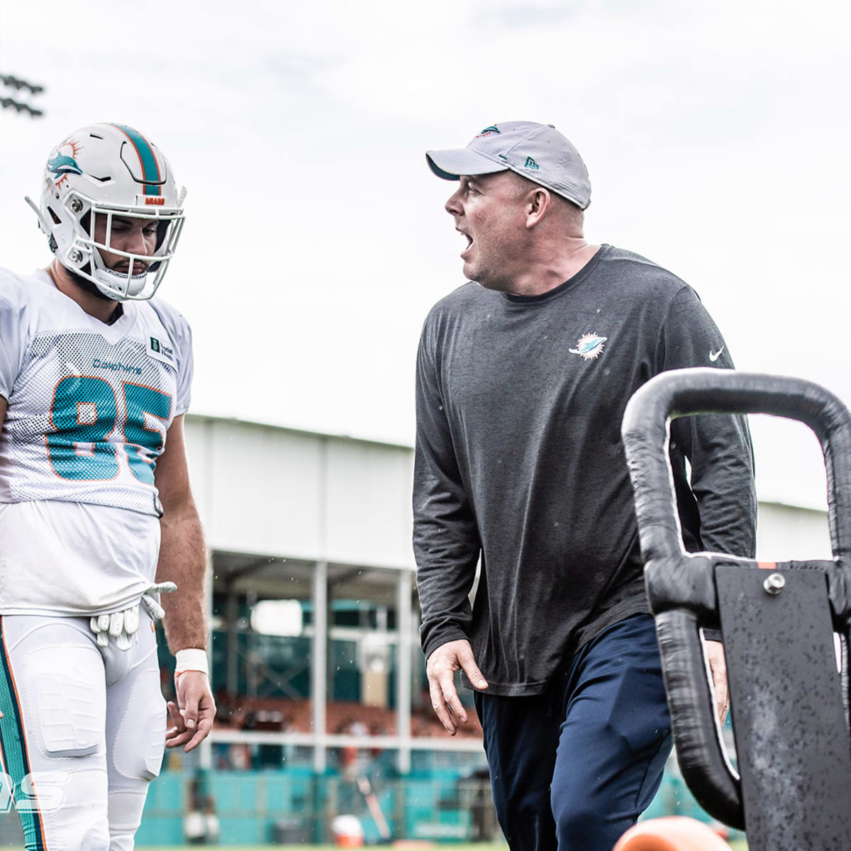 From left, Miami Dolphins wide receivers coach Josh Grizzard and