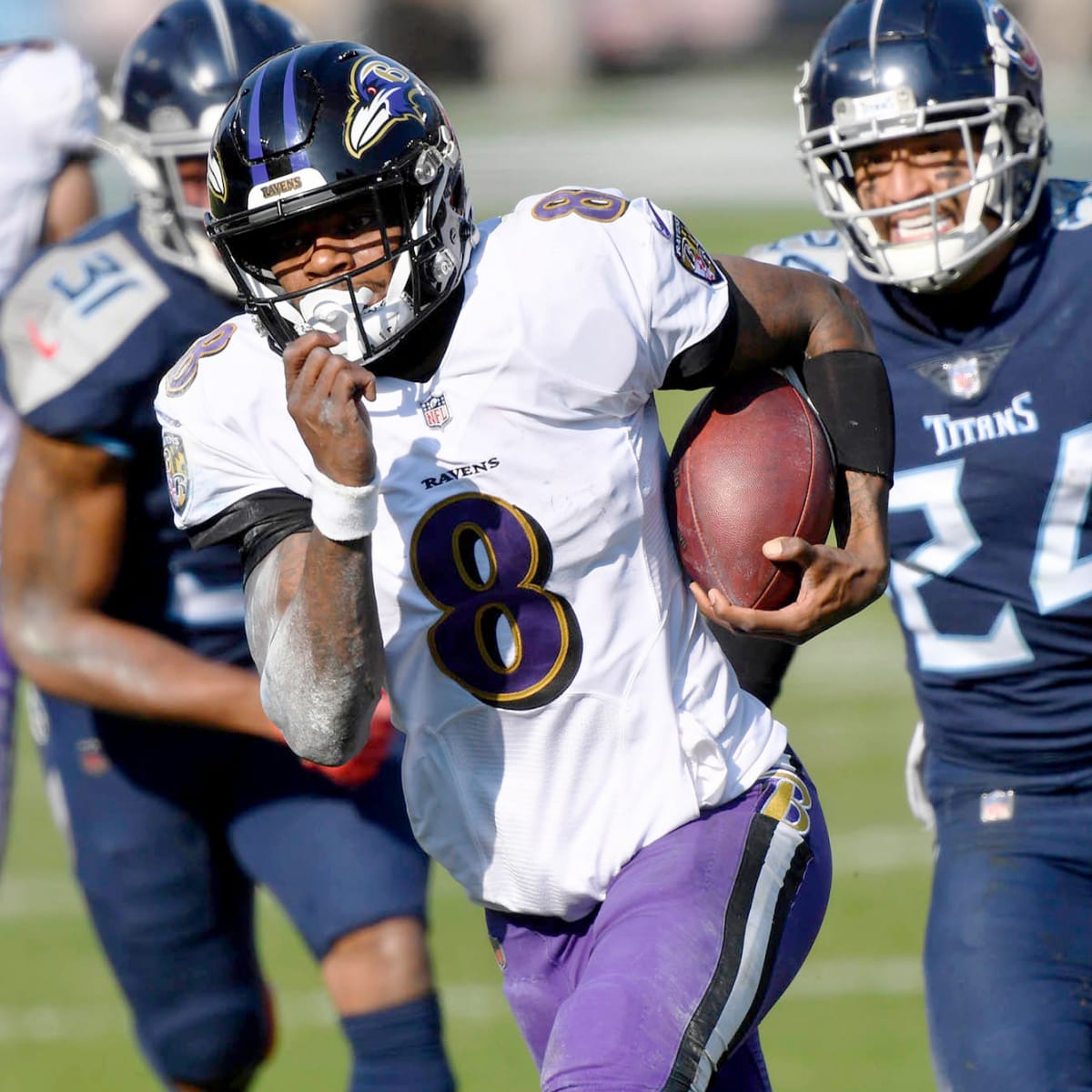 Ravens edge Titans to secure Lamar Jackson's first-career playoff win