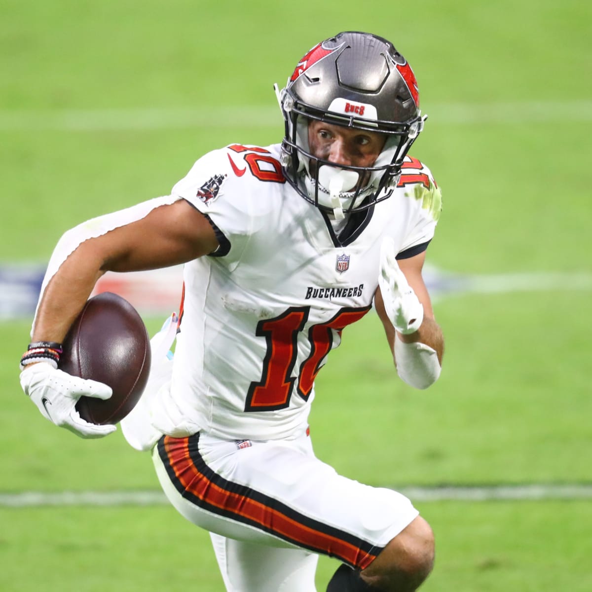 Tampa Bay Buccaneers wide receiver Scott Miller (10) runs the ball during  the second half of an NFL football game against the Atlanta Falcons,  Sunday, Dec. 20, 2020, in Atlanta. The Tampa