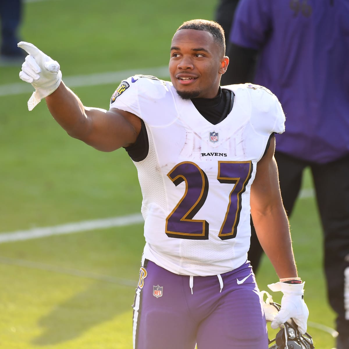 Baltimore Ravens running back J.K. Dobbins (27) runs with the ball against  the New York Giants during an NFL football game Sunday, Oct. 16, 2022, in  East Rutherford, N.J. (AP Photo/Adam Hunger