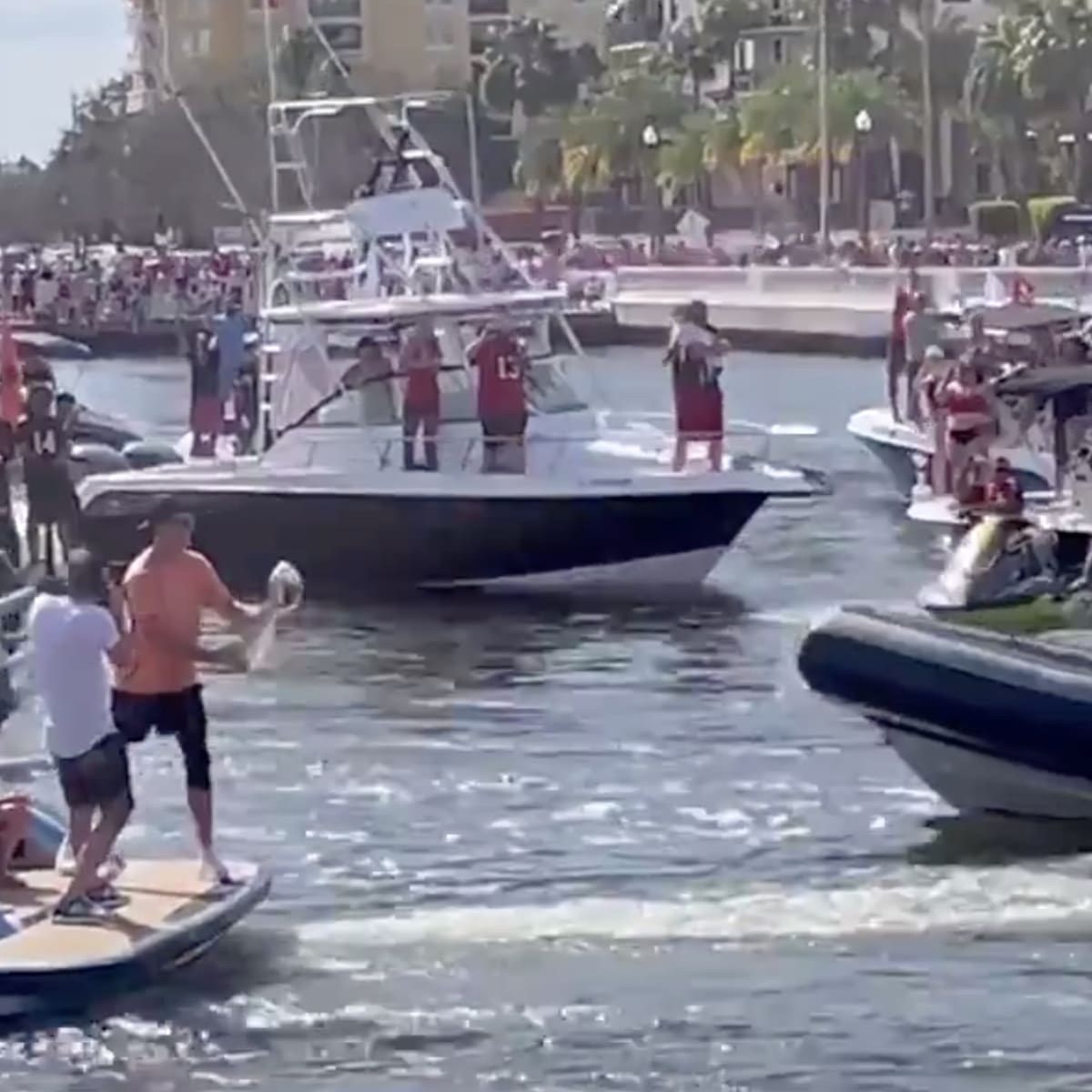 Tom Brady stumbles 'drunk' after TOSSING Super Bowl trophy during boozy  boat parade celebrating Buccaneers' shock win