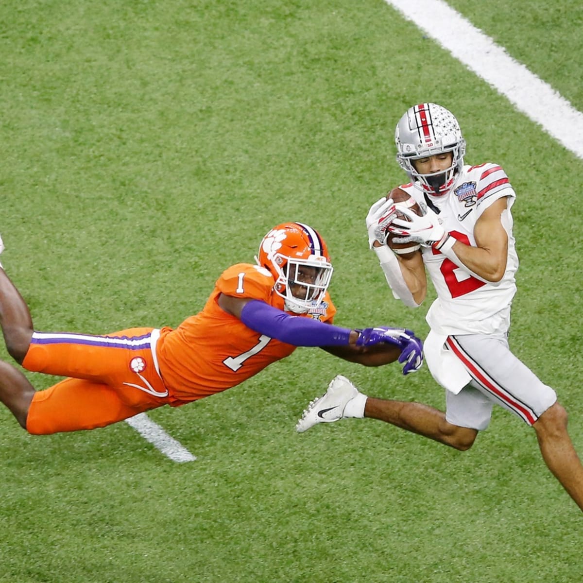 Clemson cornerback Derion Kendrick (1) and Louisville defensive