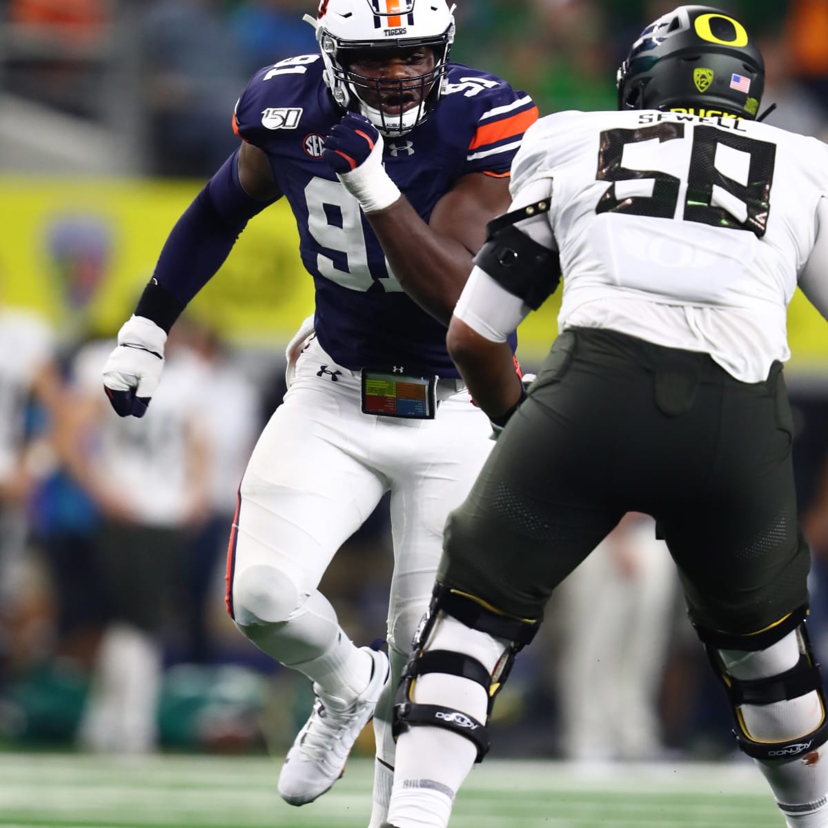 Oregon offensive lineman Penei Sewell out with ankle injury