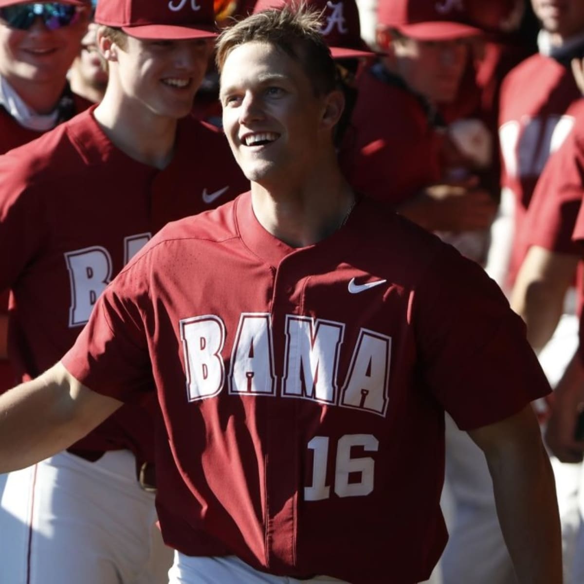 Alabama Owen Diodati (16) runs to first during an NCAA baseball